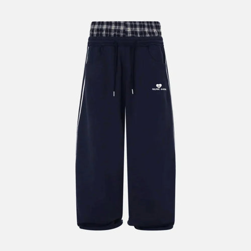 Navy blue pants with plaid double waistband